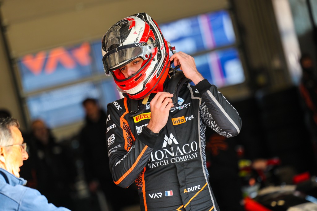 Andrea Dupé — Paddock with helmet